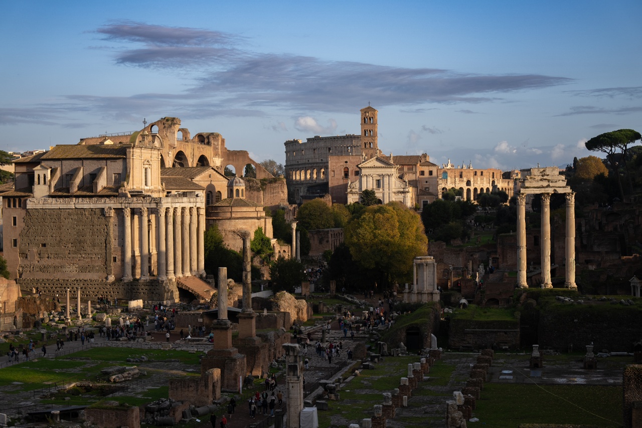 The Roman Forum with the Colosseum rising behind it